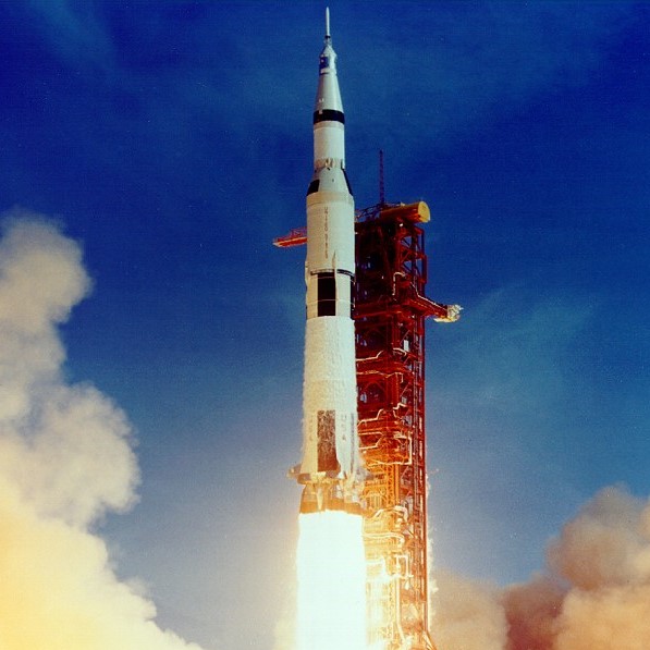 Small image of the Apollo 11 launch with the rocket off the ground with all engines firing. (Source: NASA)