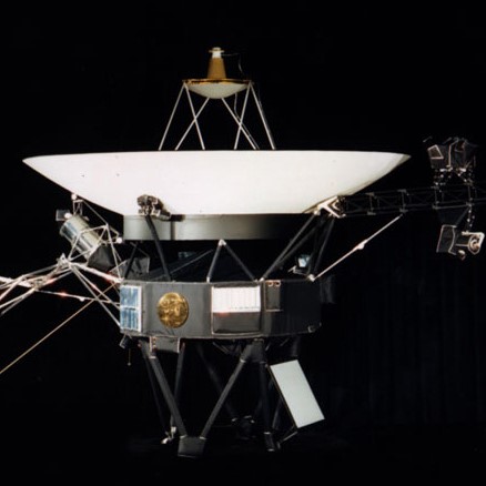 Small circular image of the Voyager space probe. (Source: NASA).